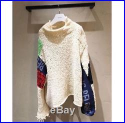 Very rare CELINE Phoebe Philo oversized handknit patchwork BELONG sweater
