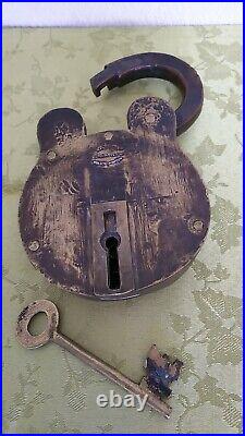 Very rare, antique padlock of brass, very large, heavy and atmospheric 47oz